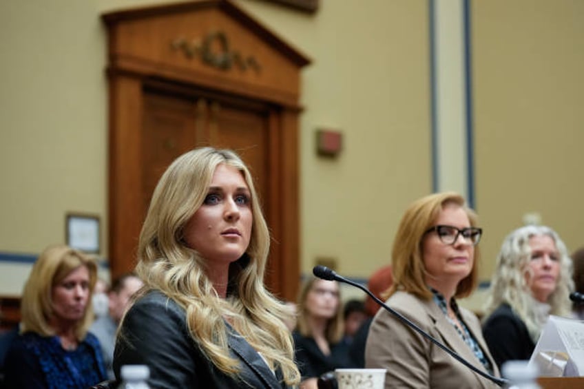 Former collegiate swimmer Riley Gaines testifies during a House Oversight Subcommittee on Health Care and Financial Services hearing on Capitol Hill...