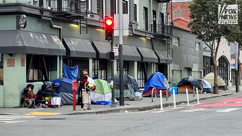 People inhabit encampments on the streets of San Francisco's Tenderloin District.