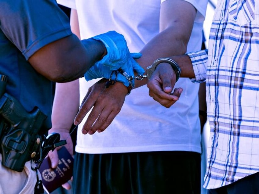JACUMBA HOT SPRINGS, CA - JUNE 08: U.S. Border Patrol agents arrest illegal asylum seekers