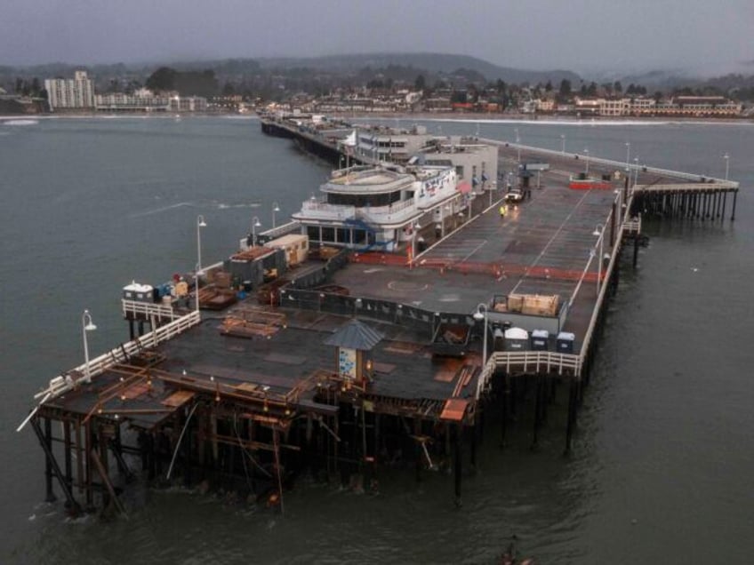 The damaged Santa Cruz Wharf is visible in Santa Cruz, Calif., Tuesday, Dec. 24, 2024. (AP