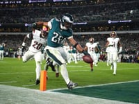 Saquon Barkley runs for 2 TDs, Eagles beat Commanders 26-18 to stretch NFC East lead