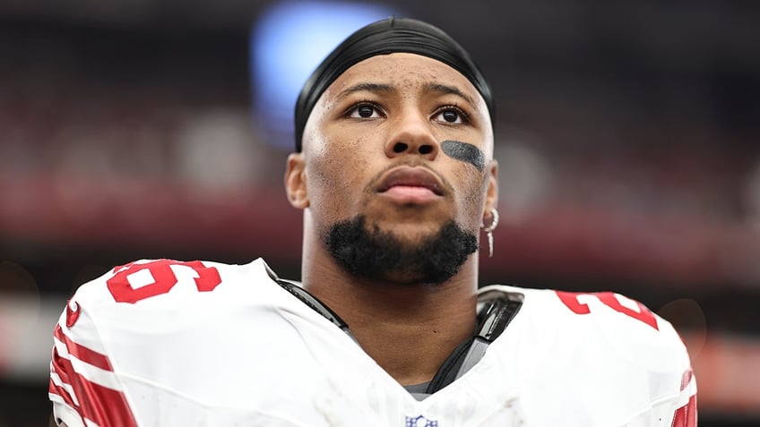 Saquon Barkley looks on field