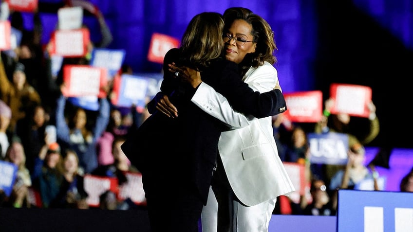 Oprah Winfrey hugs Democratic presidential nominee Vice President Kamala Harris