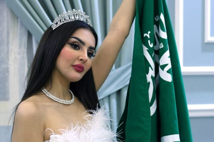 Saudi model Rumy Al-Qahtani poses for a picture during an interview with AFP at her home i