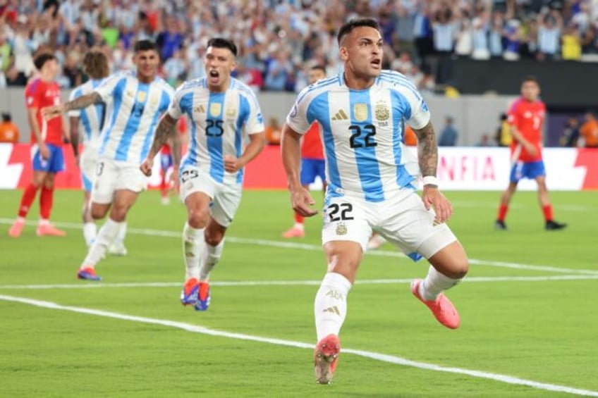 Argentina striker Lautaro Martinez celebrates his winner in the 1-0 victory over Chile in