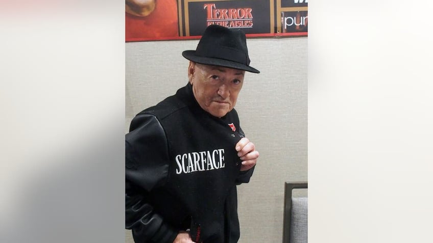 Angel Salazar wearing a Scarface jacket