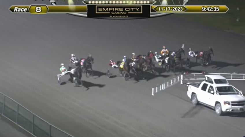 scary crash video shows harness racers horses catapulted into air