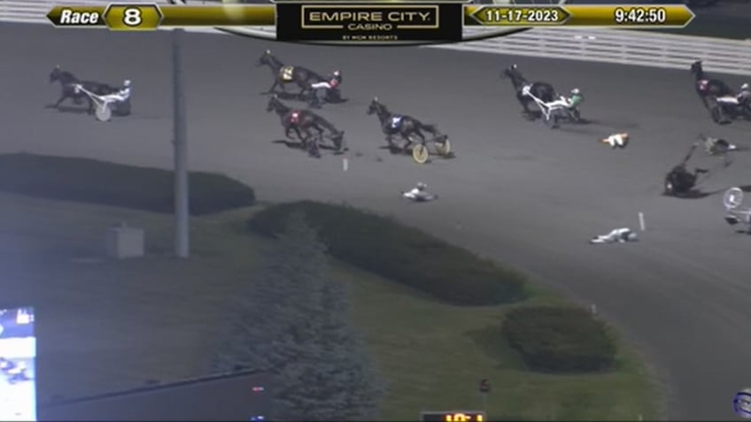 scary crash video shows harness racers horses catapulted into air