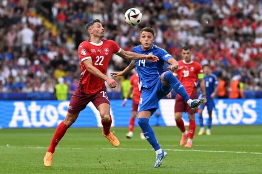 Switzerland defender Fabian Schar (left) is hoping to stun England in Saturday's Euro 2024