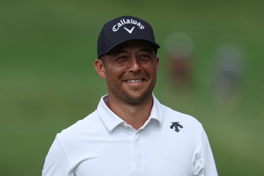 American Xander Schauffele matched the lowest round in major golf history with a nine-unde