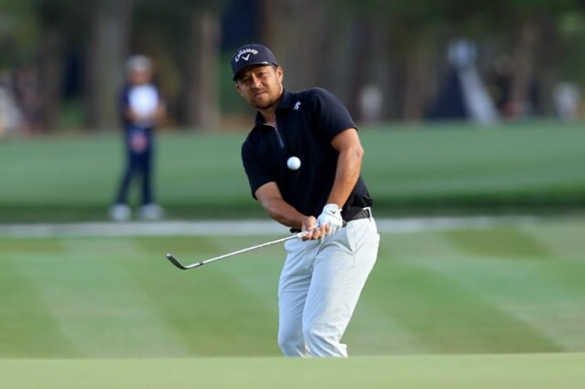 Xander Schauffele of the United States grabbed a one-stroke lead after the third round of