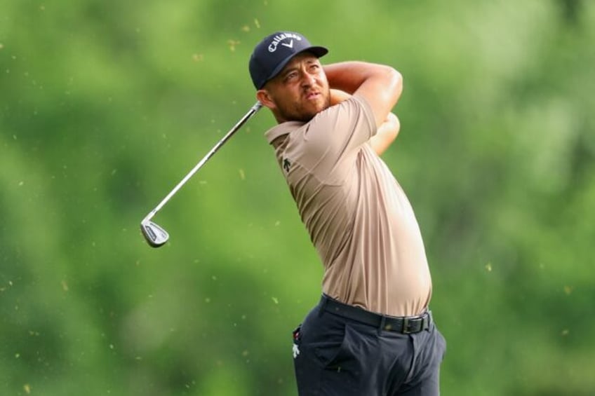 American Xander Schauffele fired a seven-under par 64 to seize a three-stroke lead after t