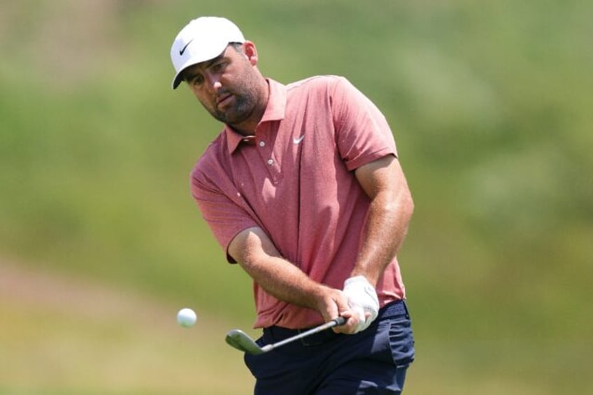World number one Scottie Scheffler plays a shot during his final practice round at Oakmont