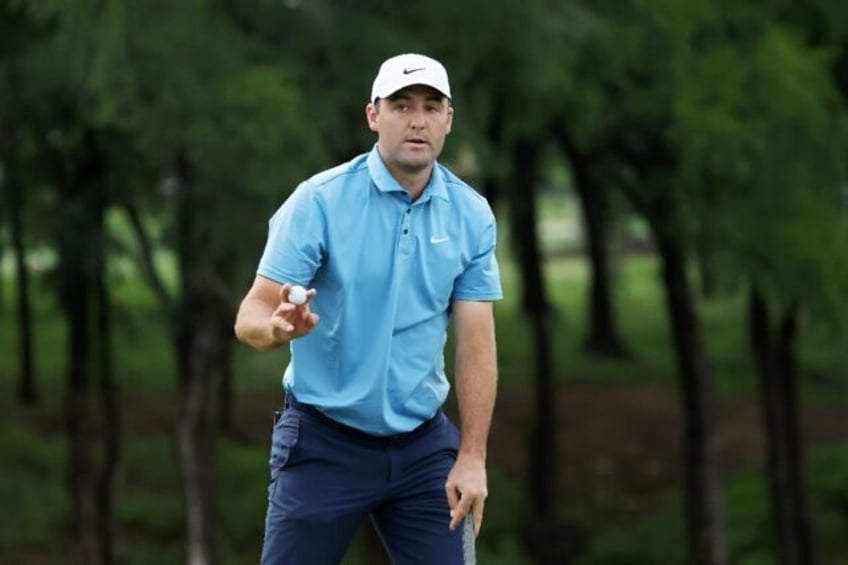 World number one Scottie Scheffler of the United States fired an eight-under par 63 to sei
