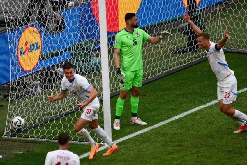 Patrik Schick bundled in an equaliser against Georgia before hobbling off with an injury