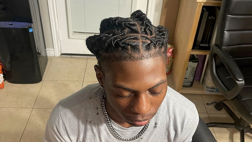 school claims no discrimination after black student suspended for hairstyle