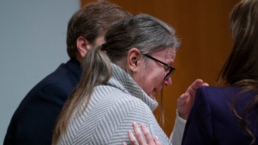 Jennifer Crumbley becomes emotional after seeing video of her son walking through Oxford High School during the Nov. 30, 2021 shooting rampage in the courtroom of Oakland County Judge Cheryl Matthews on Thursday, Jan. 25, 2024 in Pontiac, Mich.