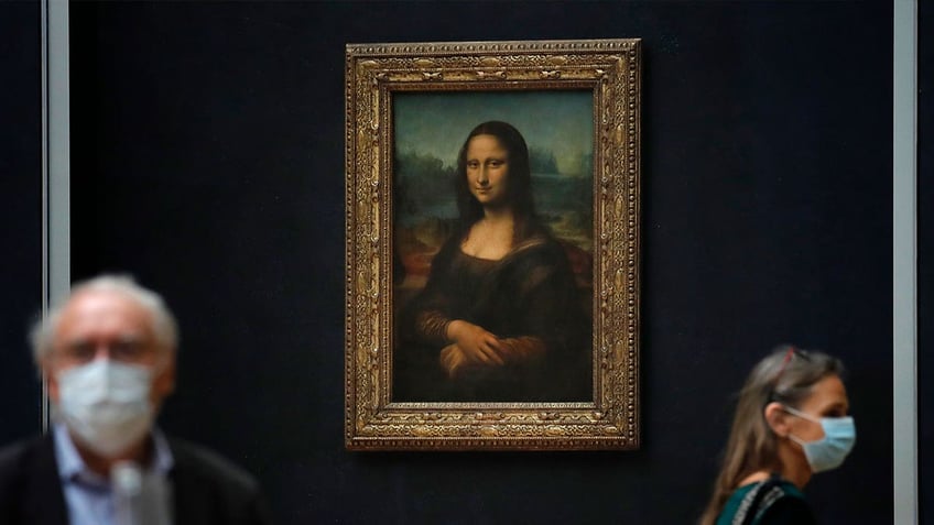 scientists use x rays to reveal clue about techniques da vincis used when painting mona lisa