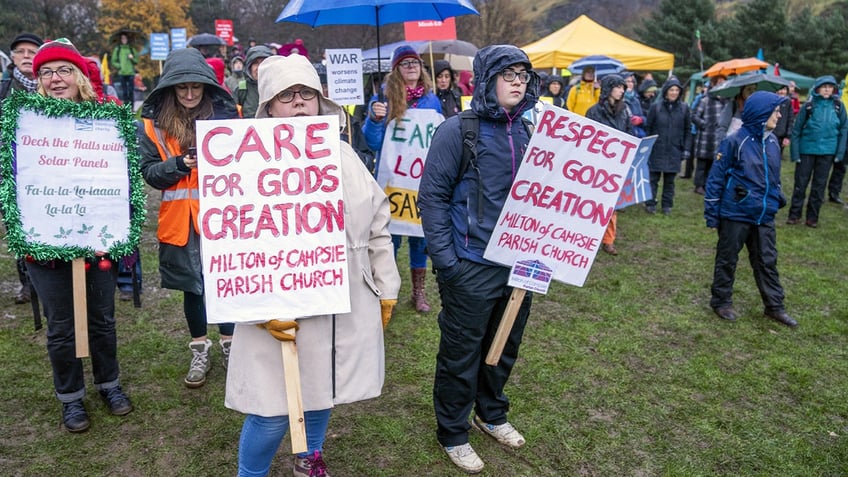 Climate protesters participate in a climate march in Scotland