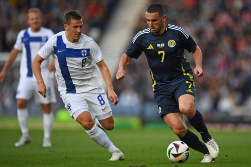 Scotland are counting on John McGinn (right) for goals at Euro 2024