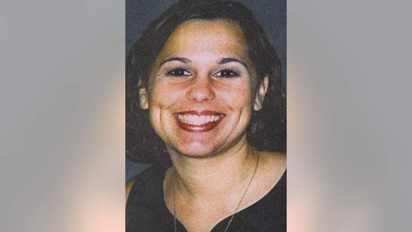 After a trial that attracted nationwide attention, California fertilizer salesman Scott Peterson, 32, was found guilty on November 12, 2004 in the Christmas Eve 2002 murder of his pregnant wife Laci. A photo from a program card from a memorial service for Laci Peterson and her unborn son is shown in this May 4, 2003 file photo. REUTERS/Lou Dematteis LD/MR