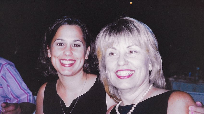 Laci Peterson and Sharon Rocha smile in an old photograph, both wearing black