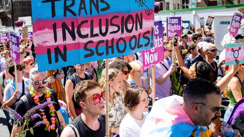 Protesters support transgender rights. 