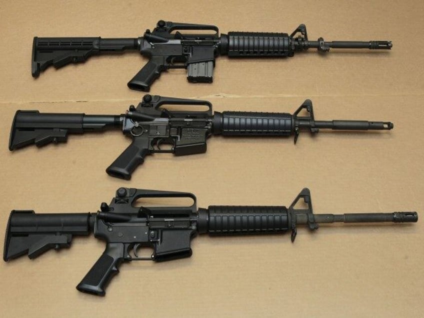 FILE -Three variations of the AR-15 assault rifle are displayed at the California Departme