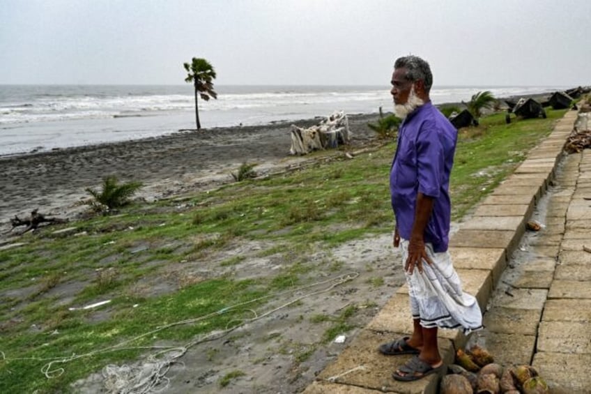 After a cyclone tore down his home in 2007, Bangladeshi fisherman Abdul Aziz moved about h