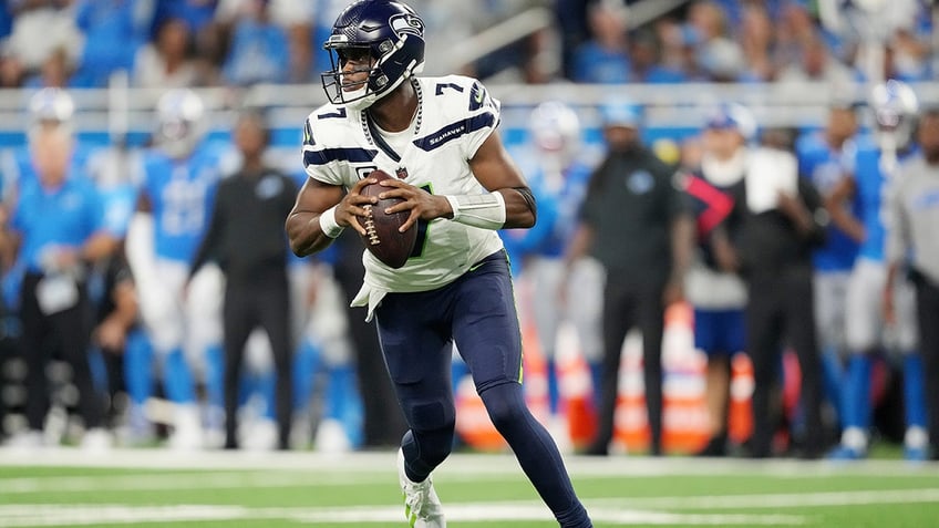 seahawks geno smith leads game winning drive in overtime to beat lions