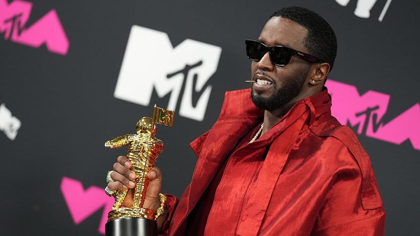 Diddy appears on a red carpet
