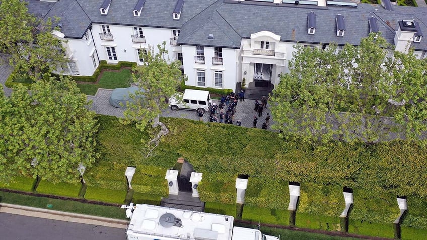 Aerial footage of Sean Combs' Los Angeles mansion being raided