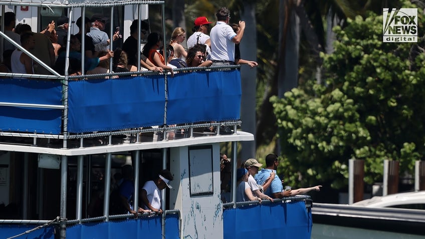 Boaters pass by rapper Diddy’s home in Miami, Florida