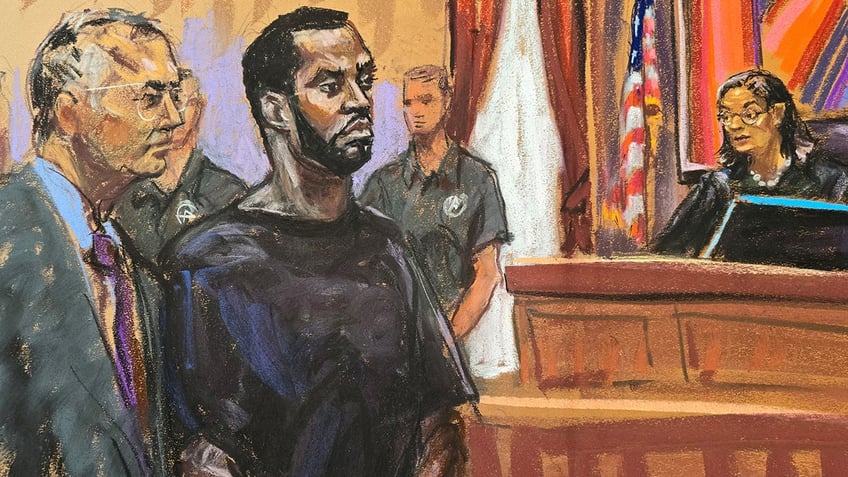 Sean "Diddy" Combs and his defense lawyer Marc Agnifilo stand before U.S. Magistrate Judge Robyn Tarnofsky after prosecutors brought three criminal charges against him in federal court