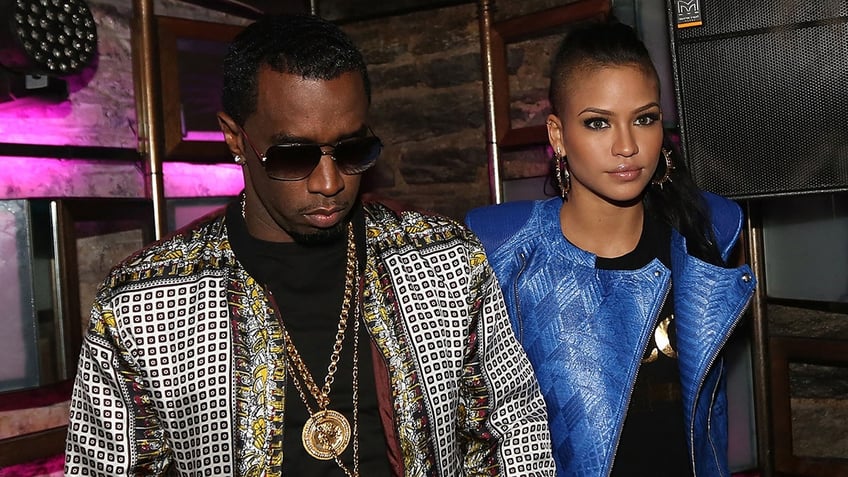 Sean "Diddy" Combs and Cassie attend Cassie's RockAByeBaby release party