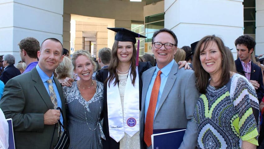 Edmond Bradley Solomon III, the patriarch of the family, surrounded by loved ones during Savannah's graduation