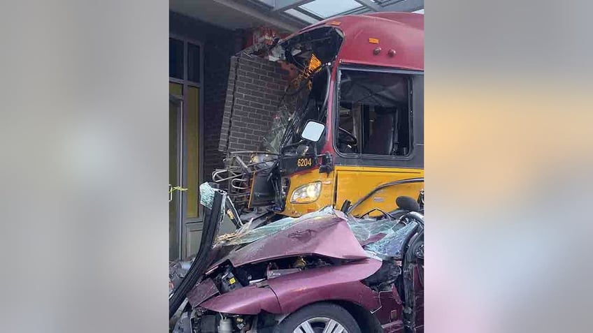 seattle bus crashes into building killing pedestrian and injuring 12