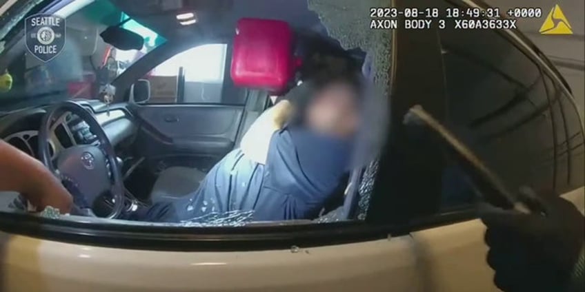 seattle police arrest burglary suspect found chugging gasoline in victims garage bodycam video shows