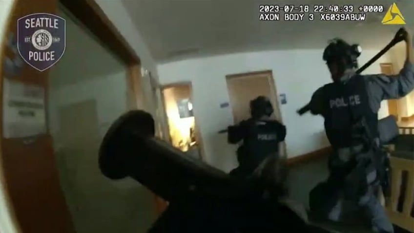 seattle swat team rescues hostage women from naked man in raid caught on bodycam video