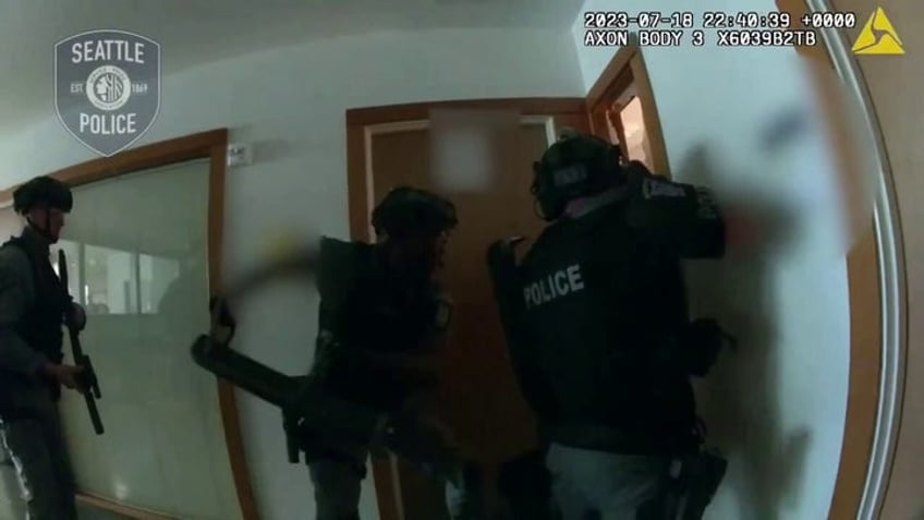 seattle swat team rescues hostage women from naked man in raid caught on bodycam video