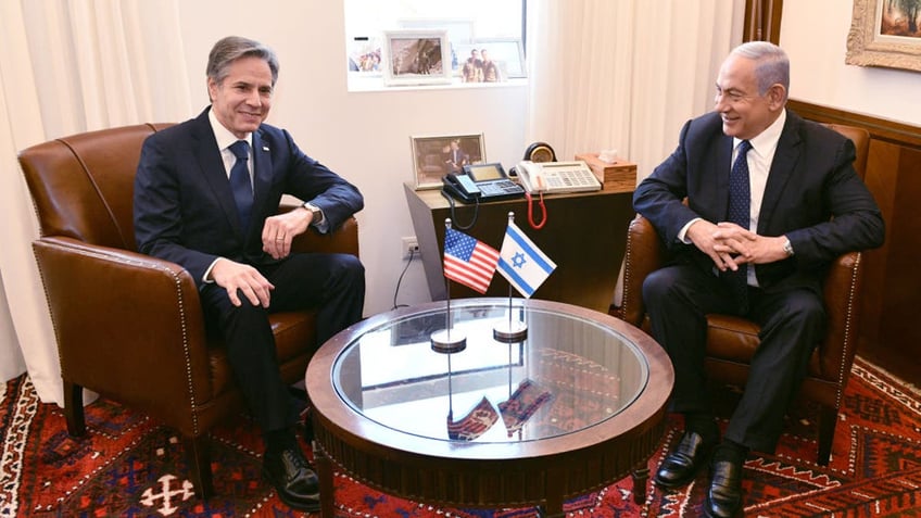 sec blinken exchanges warm greeting with palestinian president remains silent on aid for gaza