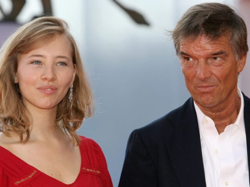 Venice, ITALY: French actress Isild Le Besco (L) and film director Benoit Jacquot arrive f