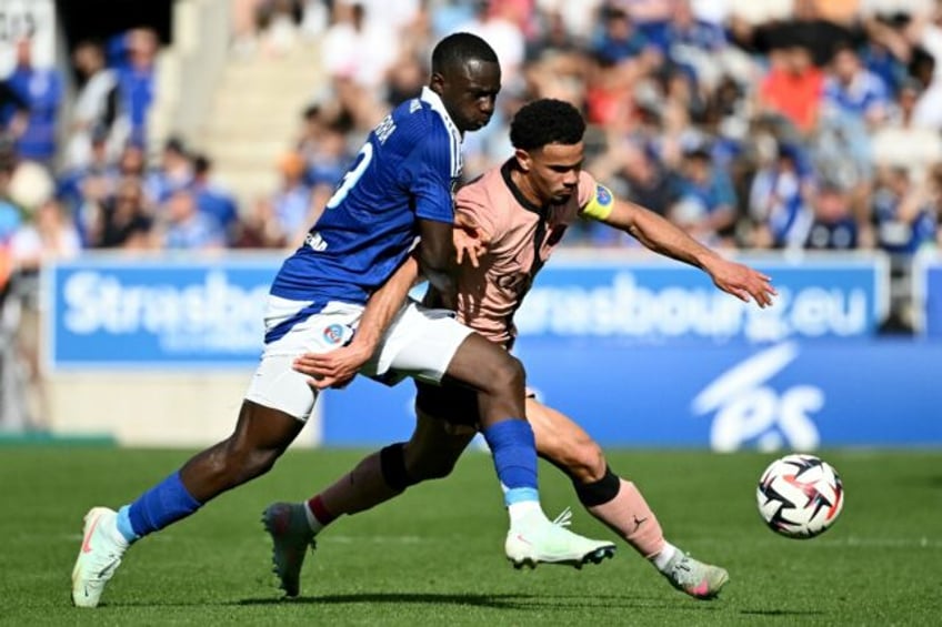 Strasbourg skipper Habib Diarra challenges PSG's Warren Zaire-Emery during Saturday's Ligu