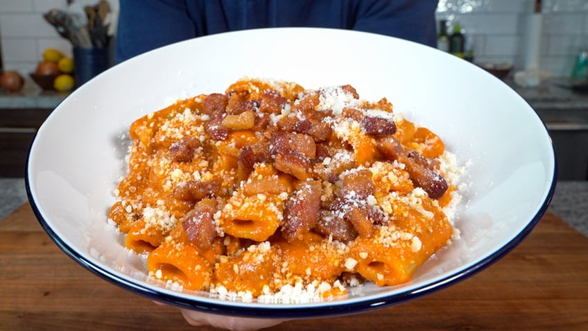 Pasta alla zozzona on a white bowl.