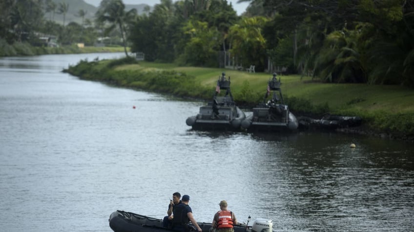 US Military patrols waterway as then-President Obama passes in motorcade