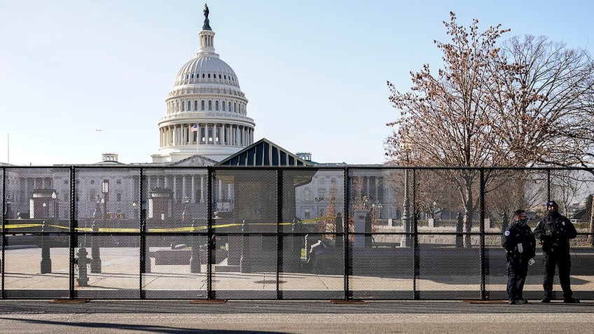 Police outside Capitol fence