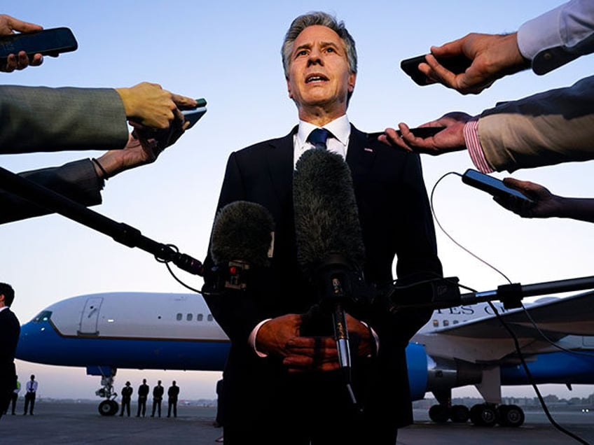 Secretary of State Antony Blinken speaks to members of the media before leaving Cairo, Oct