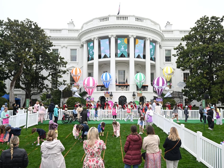 Children participate in the annual Easter Egg Roll on the South Lawn of the White House in Washington, DC, on April 1, 2024. (Photo by SAUL LOEB / AFP)