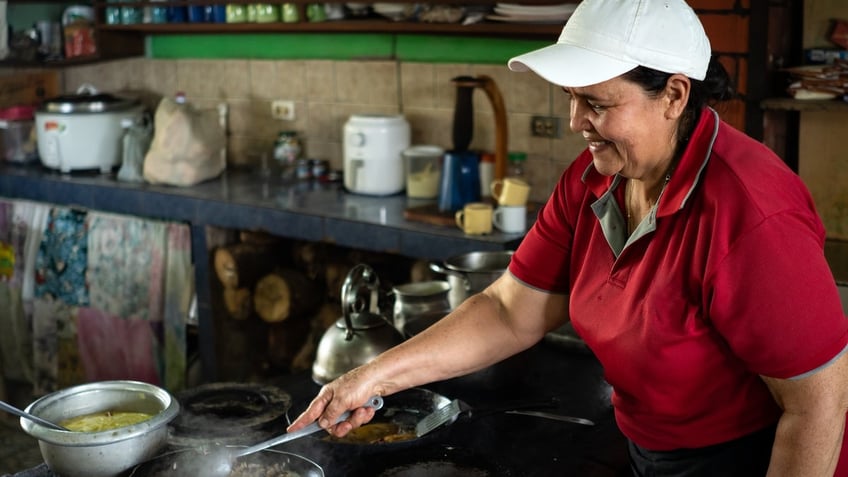 Woman cooking in Costa Rica