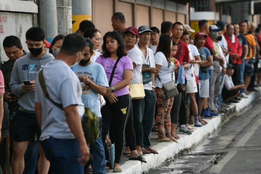 security forces on alert as filipinos vote in village polls